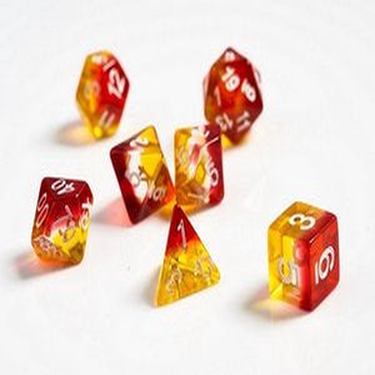 Sirius Dice Translucent Yellow-Clear-Red 7ct Polyhedral Set